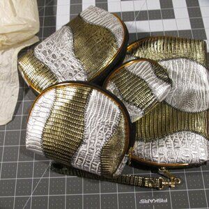 Allan Edwards by Studio Imports, 4 nesting leather look clutches - NEW